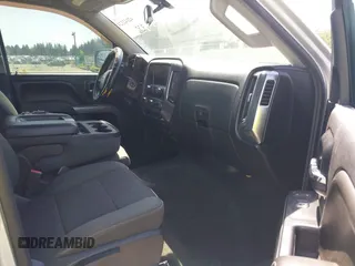 2014 Chevrolet Silverado 1500 LT with VIN 3GCUKREH0EG399090, listed as a IAAI auction lot 42142324 with 104,226 mi miles and . Bid and sale history available at DreamBid. Image 5.