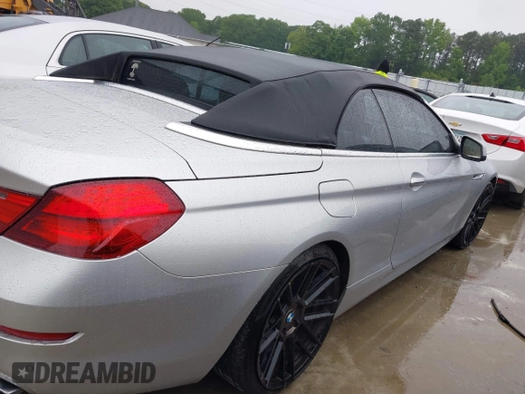 2012 BMW 6 Series 650i with VIN WBALZ3C5XCDL71723, listed as a IAAI auction lot 42204721 with 132,912 mi miles and . Bid and sale history available at carsss.com. Image 13.