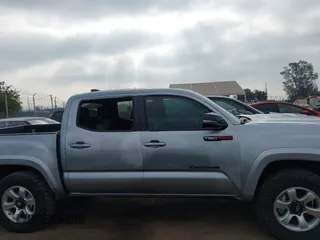 2023 Toyota Tacoma SR z VIN 3TMCZ5AN0PM538974, wystawiony jako IAAI lot #42510020 z przebiegiem 31 281 mil mil oraz . Historia ofert i sprzedaży dostępna na DreamBid. Obrazek 13.