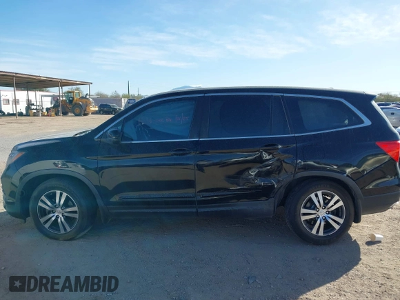 2017 Honda Pilot EX-L with VIN 5FNYF6H54HB063619, listed as a IAAI auction lot 41545415 with Not Provided miles and . Bid and sale history available at DreamBid. Image 13.
