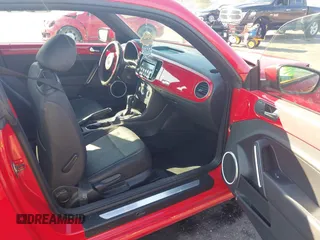 2012 Volkswagen Beetle 2.5L PZEV with VIN 3VWJP7AT0CM649068, listed as a IAAI auction lot 41684217 with 135,829 mi miles. Bid and sale history available at carsss.com. Image 5.