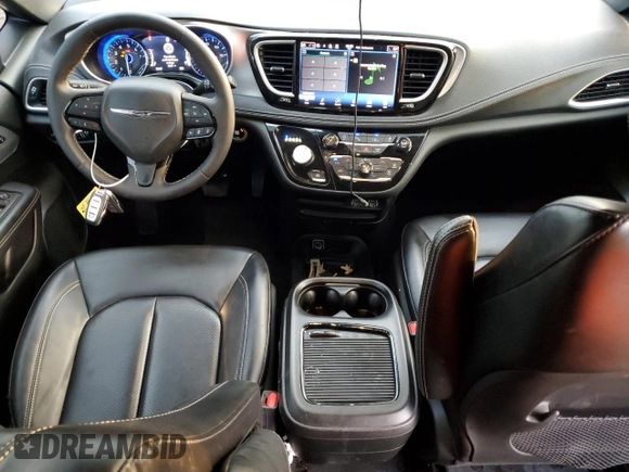 2023 Chrysler Pacifica Touring L with VIN 2C4RC1BG4PR505313, listed as a Copart auction lot 54069305 with 24,687 mi miles and Salvage title. Bid and sale history available at DreamBid. Image 8.