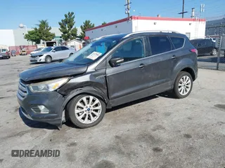 2018 Ford Escape Titanium with VIN 1FMCU0J98JUA03474, listed as a IAAI auction lot 37677880 with 106,423 mi miles and . Bid and sale history available at DreamBid. Image 17.