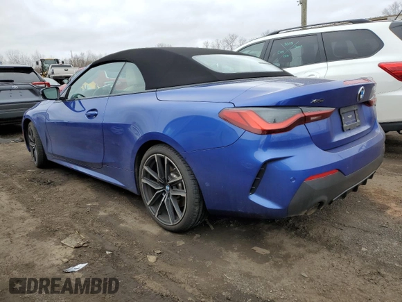 2023 BMW 4 Series 430i xDrive with VIN WBA43AT09PCM21604, listed as a Copart auction lot 49326175 with 15,305 mi miles and Salvage Title. Bid and sale history available at DreamBid. Image 2.