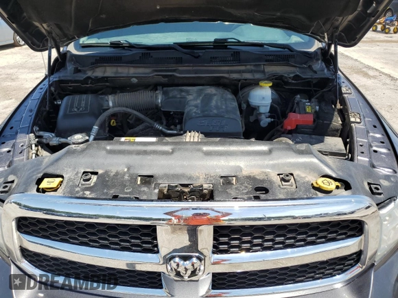 2021 Ram 1500 Tradesman with VIN 1C6RR6FG4MS524919, listed as a Copart auction lot 61338335 with 126,486 mi miles and Salvage title. Bid and sale history available at DreamBid. Image 11.