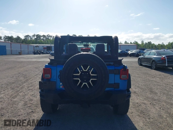 2015 Jeep Wrangler Sport z VIN 1C4AJWAG8FL550859, wystawiony jako IAAI lot #42154946 z przebiegiem 143 658 mil mil oraz . Historia ofert i sprzedaży dostępna na DreamBid. Obrazek 17.