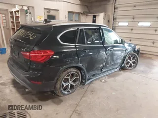 2016 BMW X1 xDrive28i z VIN WBXHT3C34GP884207, wystawiony jako IAAI lot #41686036 z przebiegiem 122 406 mil mil oraz . Historia ofert i sprzedaży dostępna na DreamBid. Obrazek 4.