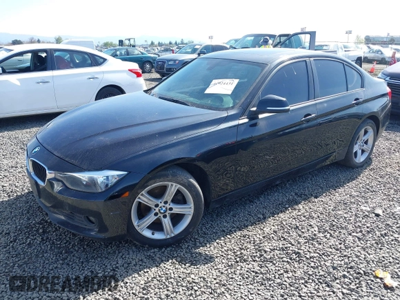 2013 BMW 3 Series 328i xDrive with VIN WBA3B5G58DNS02841, listed as a IAAI auction lot 41924431 with 106,981 mi miles. Bid and sale history available at carsss.com. Image 2.