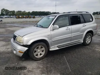 2001 Suzuki XL7 Standard z VIN JS3TX92V814116919, wystawiony jako Copart lot #72758694 z przebiegiem 185 153 mil mil oraz Szkoda całkowita • Salvage title. Historia ofert i sprzedaży dostępna na DreamBid. Obrazek 1.