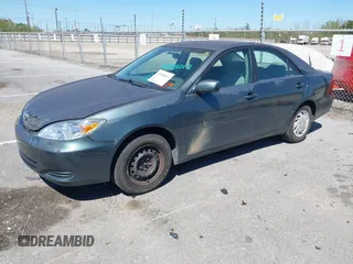 2003 Toyota Camry LE with VIN 4T1BE32K43U665972, listed as a IAAI auction lot 41858017 with 143,137 mi miles and . Bid and sale history available at DreamBid. Image 2.