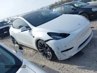 2021 Tesla Model Y Performance z VIN 5YJYGDEFXMF240246, wystawiony jako IAAI lot #42042951 z przebiegiem 76 139 mil mil oraz . Historia ofert i sprzedaży dostępna na DreamBid. Obrazek 1.