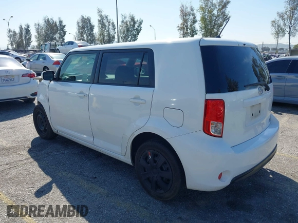 2014 Scion xB with VIN JTLZE4FE5EJ065953, listed as a IAAI auction lot 41850554 with 124,856 mi miles. Bid and sale history available at carsss.com. Image 3.