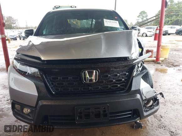 2021 Honda Passport Sport with VIN 5FNYF7H26MB014556, listed as a IAAI auction lot 41683680 with 97,829 mi miles and . Bid and sale history available at DreamBid. Image 12.