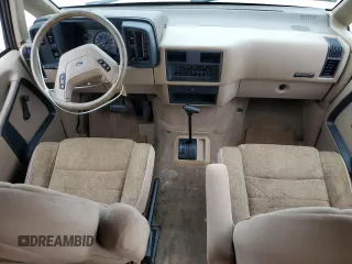 1989 Ford Aerostar z VIN 1FMDA31U4KZC55567, wystawiony jako Copart lot #88284075 z przebiegiem 45 173 mil mil oraz Szkody całkowita. Historia ofert i sprzedaży dostępna na DreamBid. Obrazek 8.