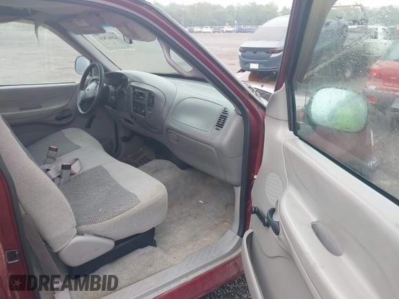1997 Ford F-150 with VIN 1FTDF176XVNB00018, listed as a IAAI auction lot 42467851 with 217,082 mi miles and . Bid and sale history available at DreamBid. Image 5.