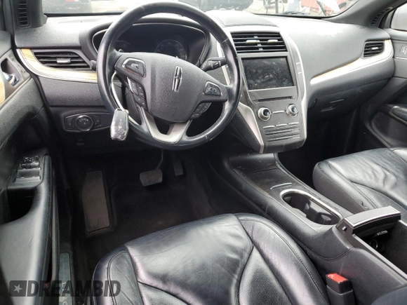 2015 Lincoln MKC z VIN 5LMCJ2A94FUJ10689, wystawiony jako Copart lot #49952045 z przebiegiem 128 040 mil mil oraz Szkoda całkowita • Salvage title. Historia ofert i sprzedaży dostępna na DreamBid. Obrazek 8.