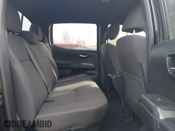 2018 Toyota Tacoma SR5 with VIN 3TMAZ5CN6JM055632, listed as a IAAI auction lot 40751593 with 125,663 mi miles and . Bid and sale history available at DreamBid. Image 8.