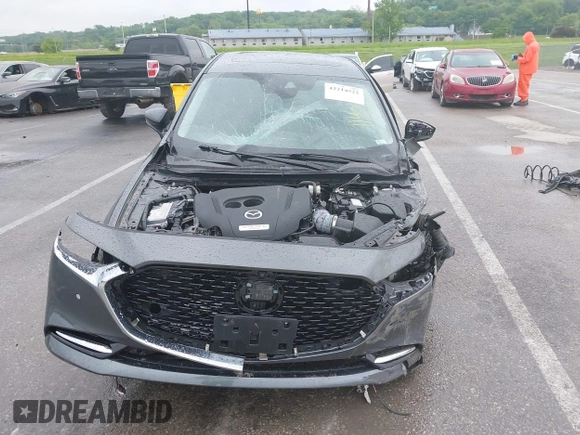 2023 Mazda 3 Premium Plus z VIN 3MZBPBEY6PM353118, wystawiony jako IAAI lot #42214522 z przebiegiem Nie podano mil oraz . Historia ofert i sprzedaży dostępna na DreamBid. Obrazek 11.