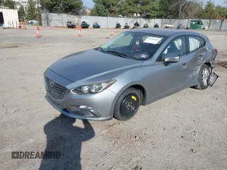 2014 Mazda 3 i Touring z VIN JM1BM1L78E1185248, wystawiony jako IAAI lot #40983056 z przebiegiem 140 911 mil mil oraz . Historia ofert i sprzedaży dostępna na DreamBid. Obrazek 2.