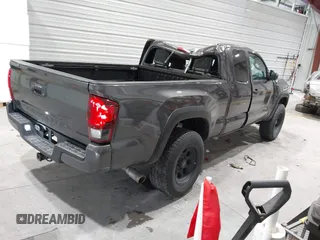 2021 Toyota Tacoma SR with VIN 3TYRX5GN8MT011370, listed as a IAAI auction lot 41287330 with 73,447 mi miles and . Bid and sale history available at DreamBid. Image 4.