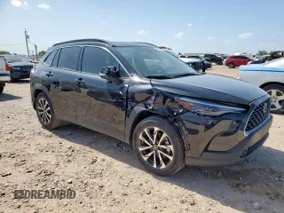 2023 Toyota Corolla Cross XLE with VIN 7MUDAAAG2PV072301, listed as a Copart auction lot 61547155 with 25,017 mi miles and Salvage title. Bid and sale history available at DreamBid. Image 4.
