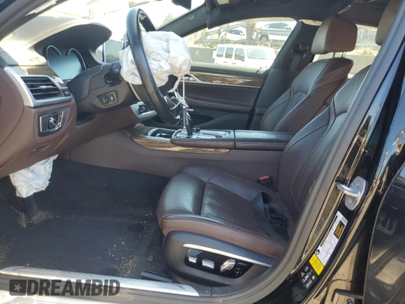 2017 BMW 7 Series 740i xDrive with VIN WBA7E4C54HGU99710, listed as a Copart auction lot 69572544 with 0 mi miles and Salvage Title. Bid and sale history available at carsss.com. Image 7.