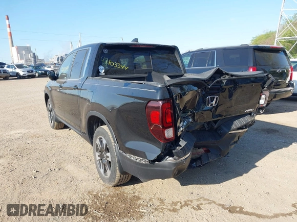 2020 Honda Ridgeline RTL with VIN 5FPYK3F52LB024816, listed as a IAAI auction lot 42103344 with 68,700 mi miles and . Bid and sale history available at DreamBid. Image 3.