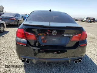 2013 BMW 5 Series 550i xDrive z VIN WBAFU9C54DDY72476, wystawiony jako Copart lot #56338925 z przebiegiem 76 018 mil mil oraz Szkoda całkowita • Salvage title. Historia ofert i sprzedaży dostępna na DreamBid. Obrazek 6.