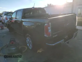 2020 GMC Canyon 4WD SLT with VIN 1GTG6DEN8L1117560, listed as a Copart auction lot 79890664 with 80,260 mi miles and Salvage Title. Bid and sale history available at carsss.com. Image 2.