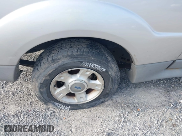 2003 Ford Explorer Sport XLS with VIN 1FMYU60E03UA63209, listed as a IAAI auction lot 42113904 with 179,998 mi miles and . Bid and sale history available at DreamBid. Image 13.