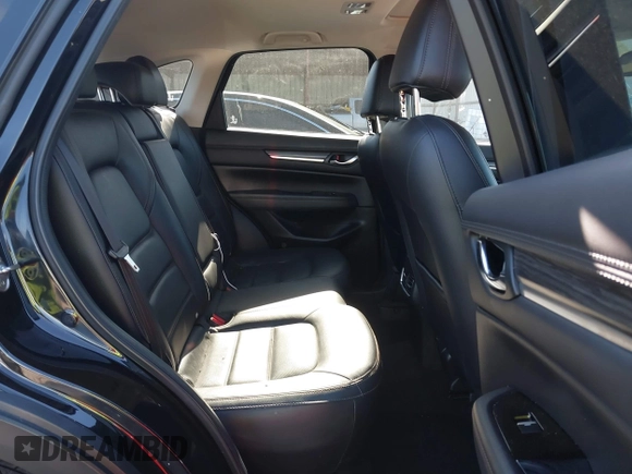 2021 Mazda CX-5 Grand Touring with VIN JM3KFADM1M0406098, listed as a IAAI auction lot 41654735 with 33,050 mi miles. Bid and sale history available at carsss.com. Image 8.