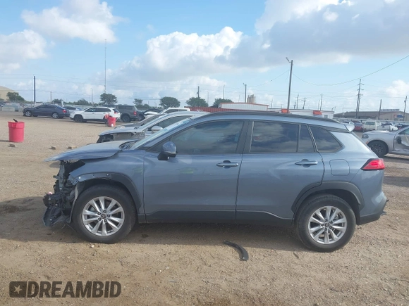 2022 Toyota Corolla Cross LE with VIN 7MUCAAAG0NV018245, listed as a IAAI auction lot 42039762 with 26,690 mi miles and . Bid and sale history available at DreamBid. Image 15.