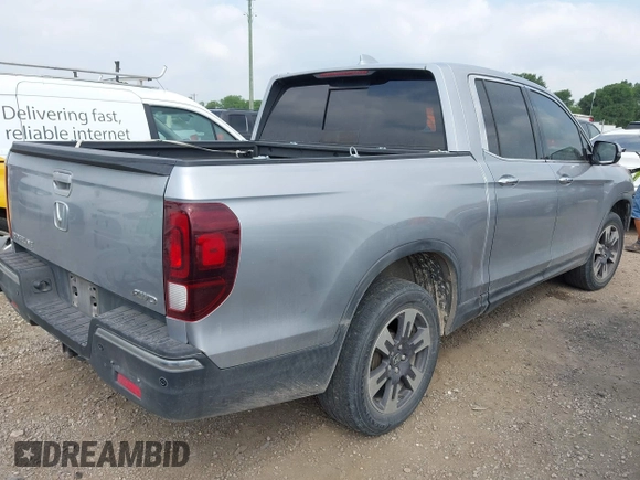 2019 Honda Ridgeline RTL-E with VIN 5FPYK3F73KB006244, listed as a IAAI auction lot 42167460 with 53,498 mi miles and . Bid and sale history available at DreamBid. Image 4.