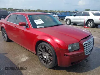 2010 Chrysler 300 with VIN 2C3CA2CV3AH279913, listed as a IAAI auction lot 40731536 with 143,969 mi miles. Bid and sale history available at carsss.com. Image 1.