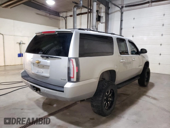 2011 Chevrolet Suburban LT z VIN 1GNSKJE34BR341094, wystawiony jako Copart lot #53376515 z przebiegiem 187 219 mil mil oraz Czysty tytuł • Clean title. Historia ofert i sprzedaży dostępna na DreamBid. Obrazek 3.