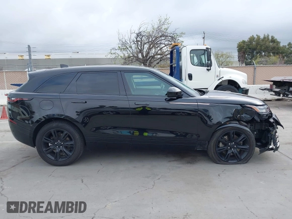 2022 Land Rover Range Rover Velar R-Dynamic S z VIN SALYT2EX7NA334581, wystawiony jako IAAI lot #41892379 z przebiegiem 33 295 mil mil oraz . Historia ofert i sprzedaży dostępna na DreamBid. Obrazek 13.