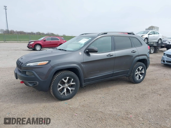 2016 Jeep Cherokee Trailhawk z VIN 1C4PJMBS4GW167650, wystawiony jako IAAI lot #41936549 z przebiegiem 218 000 mil mil oraz . Historia ofert i sprzedaży dostępna na DreamBid. Obrazek 17.
