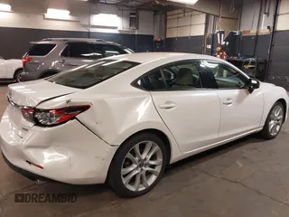 2014 Mazda Mazda6 i Touring with VIN JM1GJ1V68E1147067, listed as a IAAI auction lot 42105878 with 102,684 mi miles. Bid and sale history available at carsss.com. Image 6.