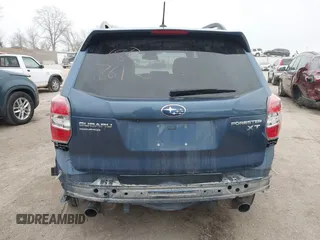 2014 Subaru Forester XT Touring with VIN JF2SJGMC9EH428341, listed as a IAAI auction lot 41185804 with 111,000 mi miles and . Bid and sale history available at DreamBid. Image 16.