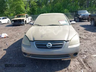 2002 Nissan Altima S with VIN 1N4AL11D32C291507, listed as a IAAI auction lot 41997253 with 199,769 mi miles. Bid and sale history available at carsss.com. Image 6.