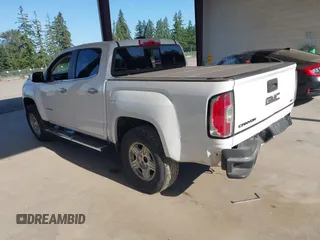 2015 GMC Canyon 2WD SLE with VIN 1GTG5CEA1F1273955, listed as a IAAI auction lot 42392908 with 79,981 mi miles and . Bid and sale history available at DreamBid. Image 3.