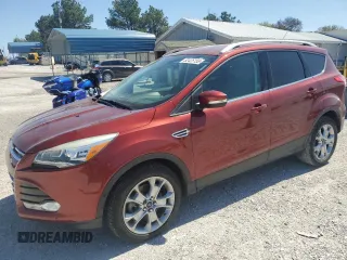 2016 Ford Escape Titanium with VIN 1FMCU9J99GUA91223, listed as a Copart auction lot 54666545 with 109,684 mi miles and Salvage title. Bid and sale history available at DreamBid. Image 1.