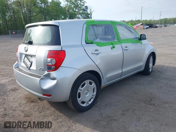 2008 Scion xD with VIN JTKKU104X8J023306, listed as a IAAI auction lot 42120680 with 200,746 mi miles. Bid and sale history available at carsss.com. Image 4.