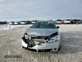 2006 Pontiac G6 6-Cyl z VIN 1G2ZG558764174412, wystawiony jako Copart lot #45677485 z przebiegiem 286 524 mil mil oraz Czysty tytuł • Clean title. Historia ofert i sprzedaży dostępna na DreamBid. Obrazek 10.
