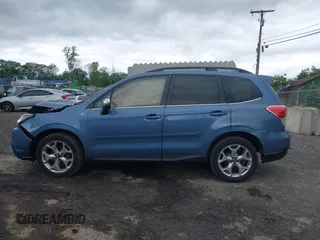 2018 Subaru Forester Touring with VIN JF2SJAWC5JH528330, listed as a IAAI auction lot 42344618 with 62,446 mi miles and . Bid and sale history available at DreamBid. Image 14.