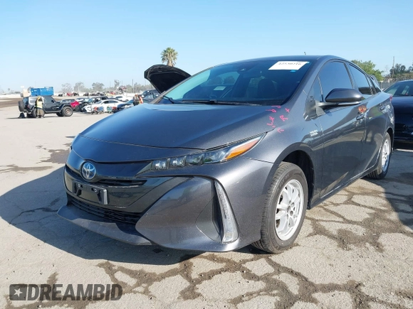 2021 Toyota Prius LE with VIN JTDKAMFP1M3195662, listed as a IAAI auction lot 42799476 with 47,560 mi miles and . Bid and sale history available at DreamBid. Image 2.