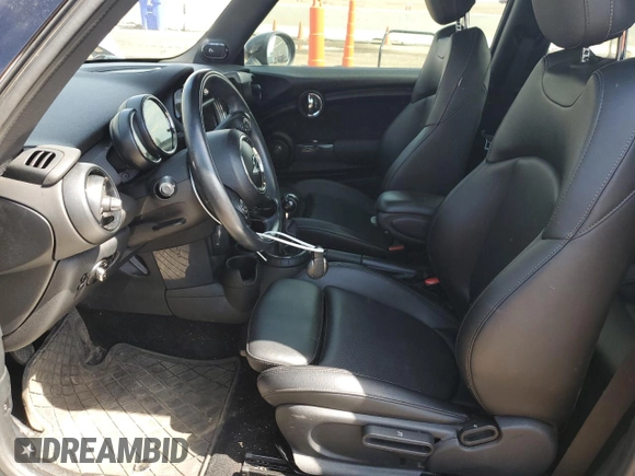 2015 MINI Hardtop with VIN WMWXM5C5XFT974077, listed as a Copart auction lot 58063965 with 93,853 mi miles and Salvage title. Bid and sale history available at DreamBid. Image 7.