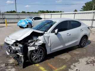 2019 Toyota Yaris L z VIN 3MYDLBYV7KY519027, wystawiony jako Copart lot #57104345 z przebiegiem Nie podano mil oraz Szkoda całkowita • Salvage title. Historia ofert i sprzedaży dostępna na DreamBid. Obrazek 1.