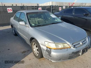 2002 Honda Accord SE z VIN 1HGCG567X2A175896, wystawiony jako IAAI lot #42557502 z przebiegiem 213 229 mil mil oraz . Historia ofert i sprzedaży dostępna na DreamBid. Obrazek 1.