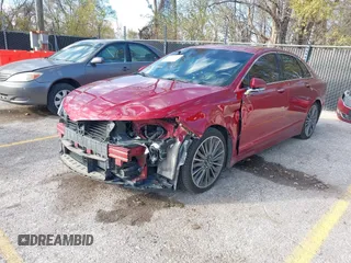 2016 Lincoln MKZ with VIN 3LN6L2JK1GR600996, listed as a IAAI auction lot 40903544 with 152,902 mi miles and . Bid and sale history available at DreamBid. Image 2.